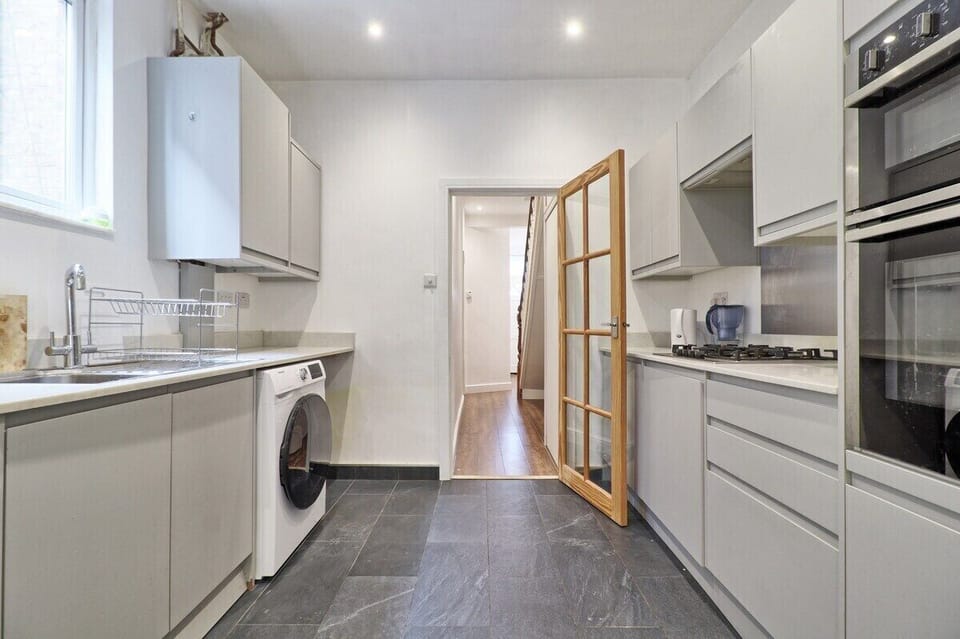 With Washer Dryer