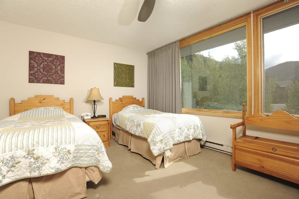 Drift to sleep in the comfortable bedroom. Bedding configurations vary.