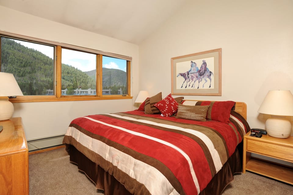 Drift to sleep in the comfortable bed. Bedding configurations vary.