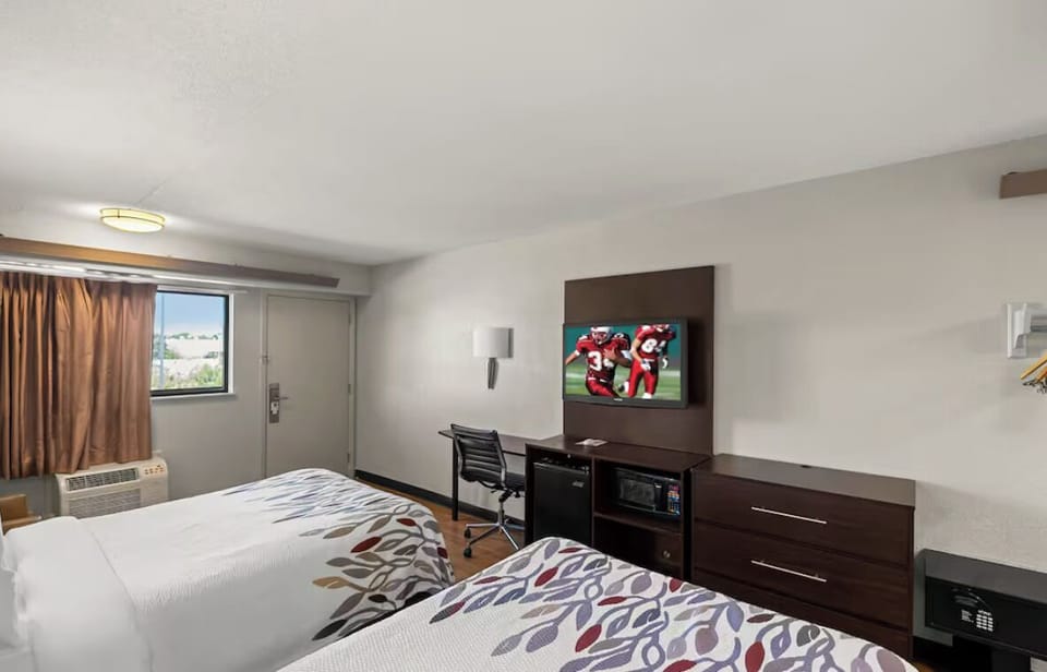 Start your evening with TV, desk space, and easy comfort.