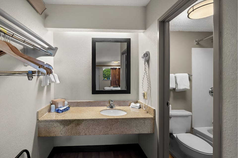 Get ready easily with convenient counter space and mirror.