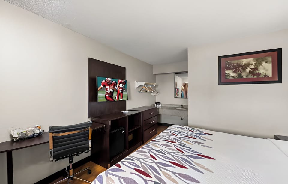 Catch up on work at the desk, then unwind in bed.