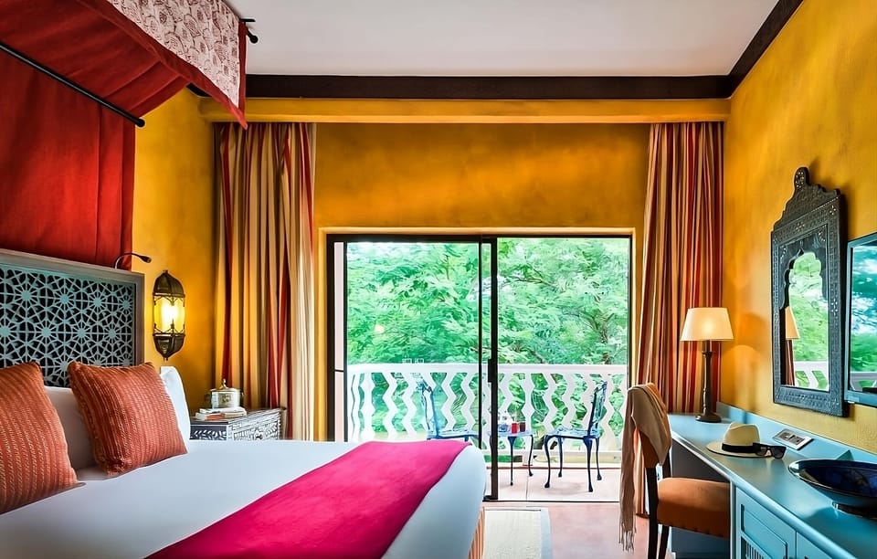 Linger in a cozy room framed by bold, warm colors.