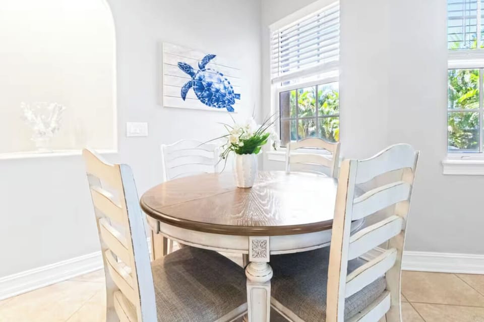 Breakfast nook, table expands to seat 6, leaf located in primary bedroom closet.
