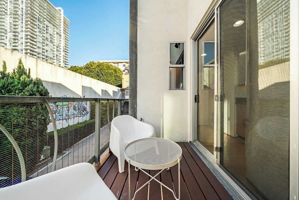 Balcony | Seating and Table | Partial View of Downtown