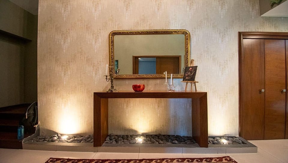 Elegant entryway with warm lighting and stylish decor