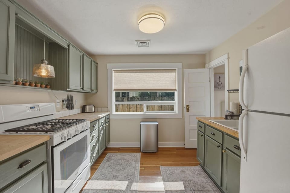 Light and bright, this kitchen is fully stocked for preparing your meals
