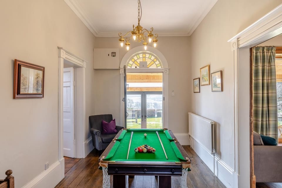 Challenge family and friends to a game of pool
