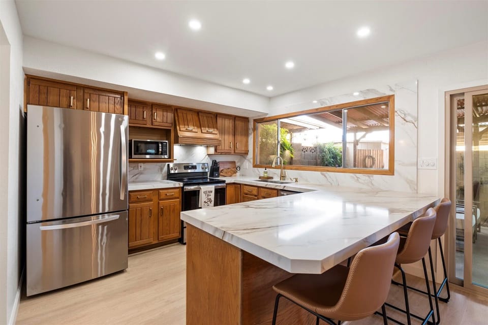 Big kitchen with plenty of counter space and breakfast bar
