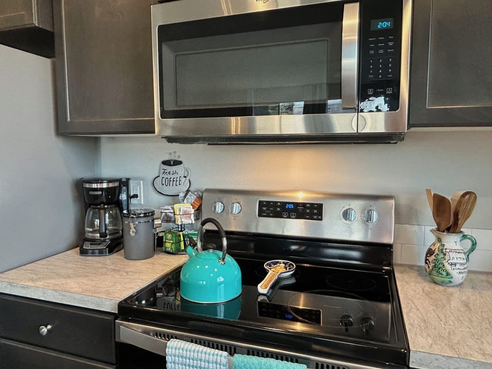 Coffee and tea are provided, with some sweet and low, and raw sugar.