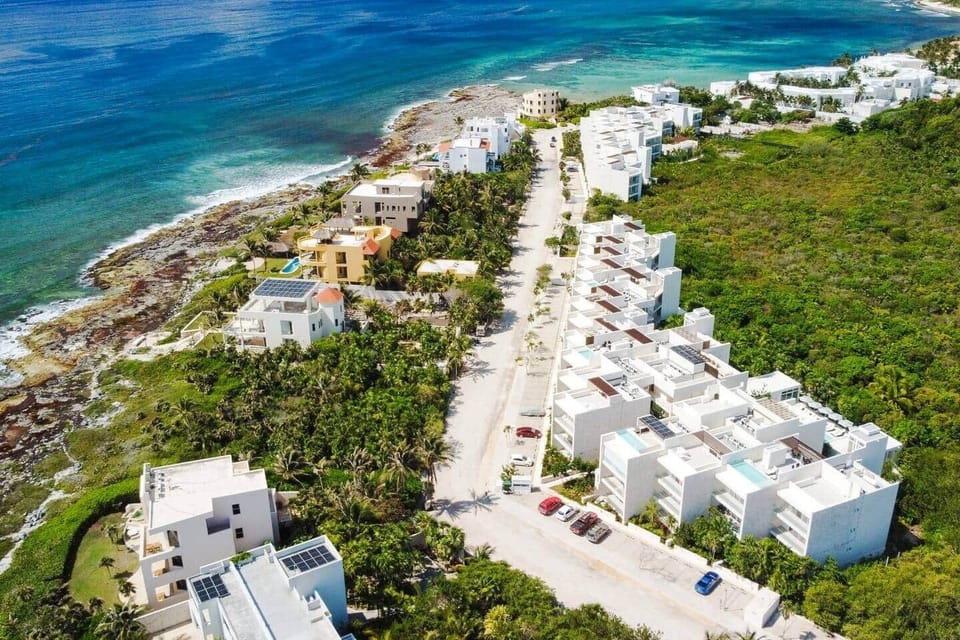 Experience awe-inspiring views from above! Our coastal sanctuary, nestled along the Caribbean Sea, provides a mesmerizing aerial perspective of paradise.
