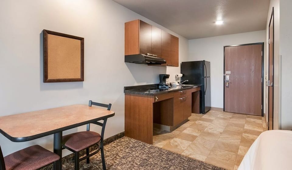 Gather for easy meals at the cozy in-room table.