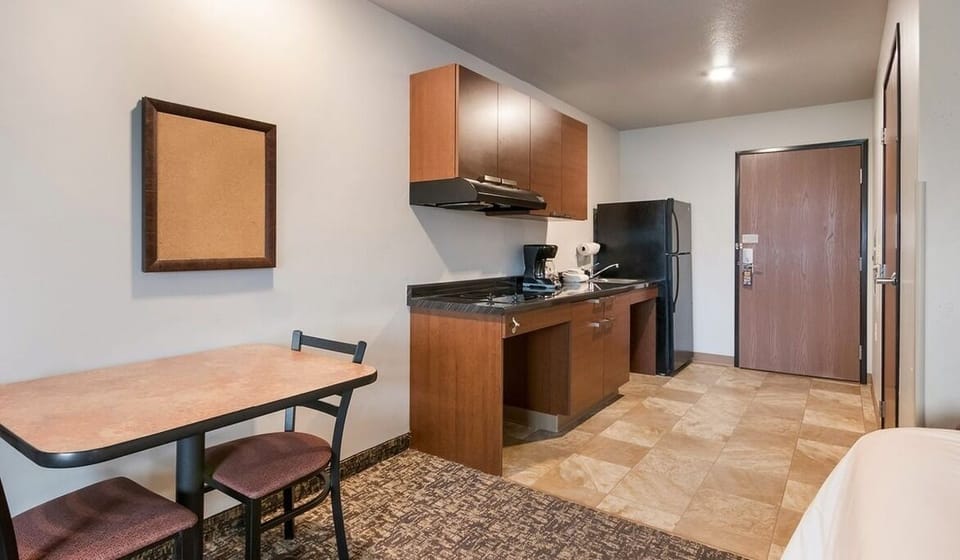 Gather for casual meals with a full kitchenette close by.