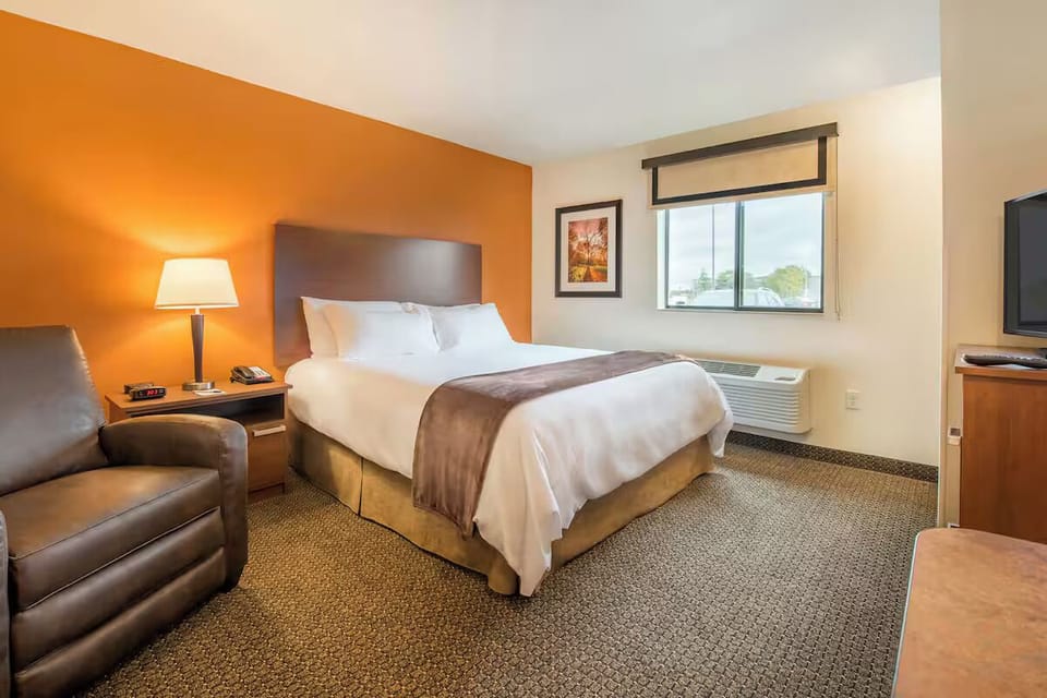 Settle into crisp linens and recharge in quiet comfort.