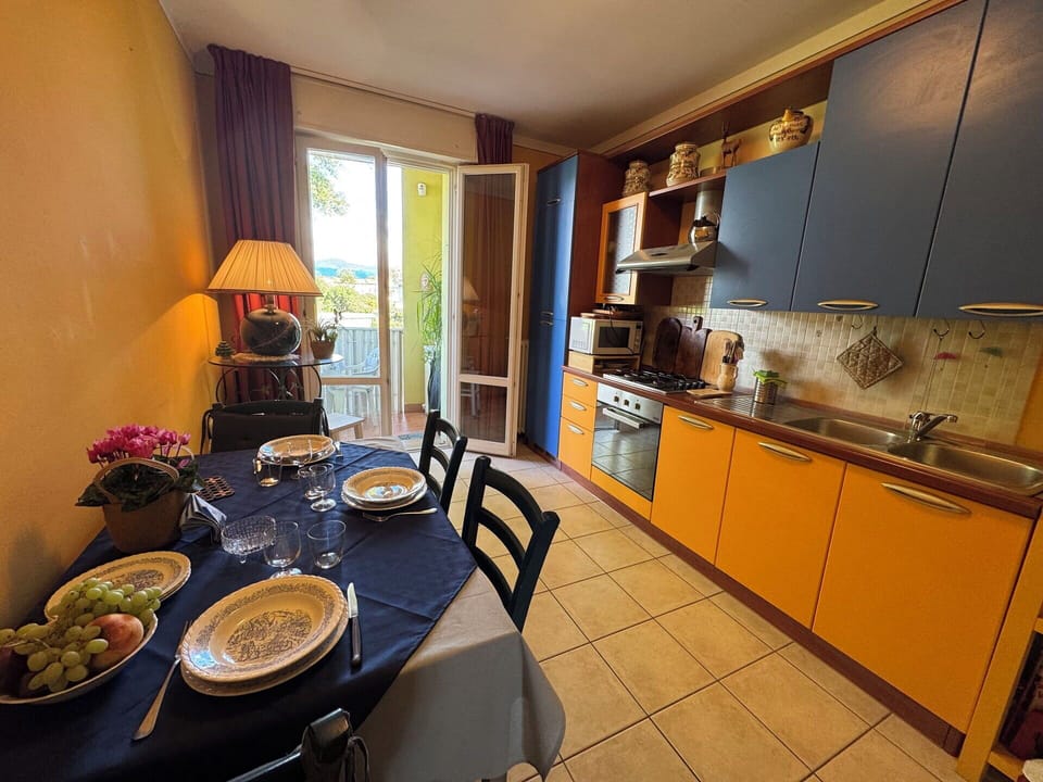 Flooring, Furniture, Floor, Apartment, Chair, Houseplant, Kitchen & Dining Room Table, Wood Stain, Kitchen, Kitchen Appliance