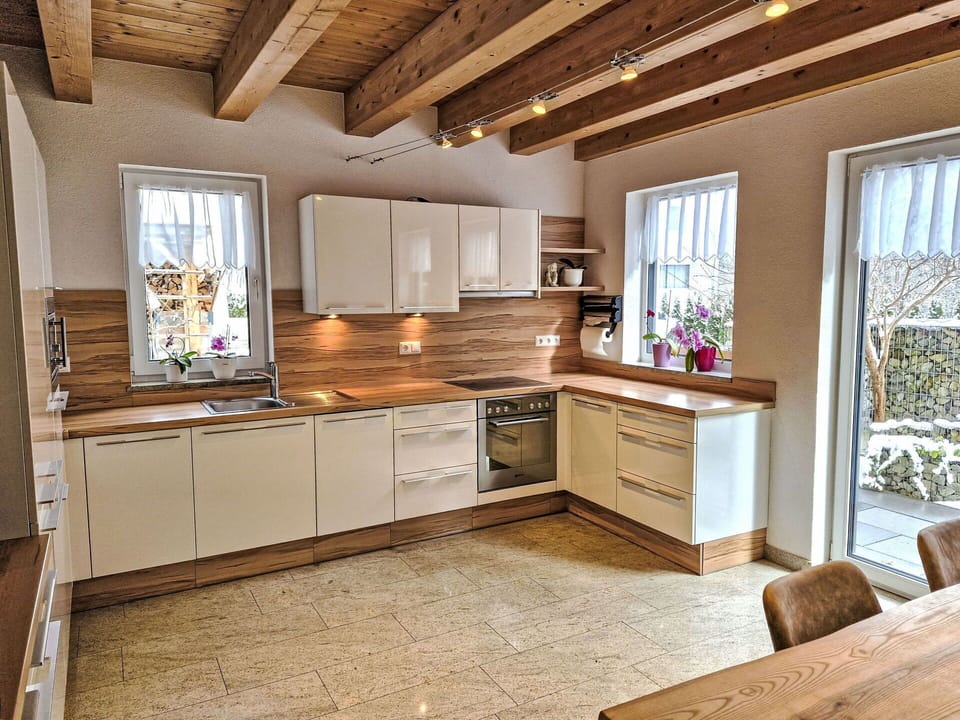 Kitchen, Countertop, Furniture, Flooring, Kitchen Appliance, Interior Design, Cabinetry, Major Appliance, Wood, Floor