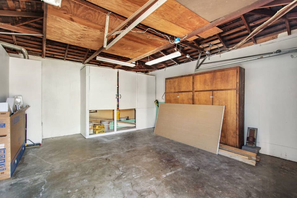 Garage access available for parking and storage.