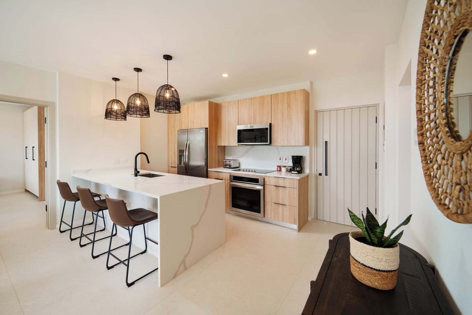 Fantastic amenities including a roof deck which will feature a sky pool, barbecue area, seating area with fire pit and an amazing view of the sea