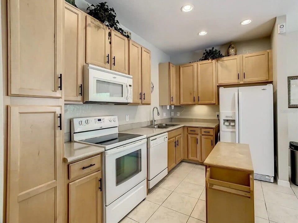 A fully equipped kitchen ready for your vacation recipes. Enjoy the convenience of home-cooked meals with plenty of space to prep and serve.