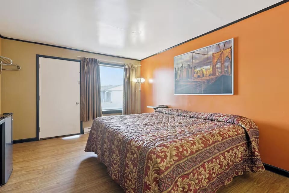 Unwind after adventures in a bright room with comfy king bed.