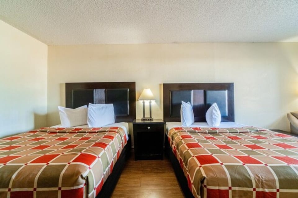 Unwind into crisp linens and a cozy, restful night.