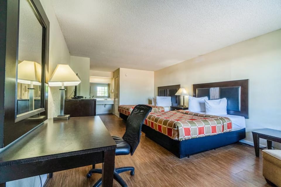 Spread out comfortably with a dedicated desk and warm lighting.