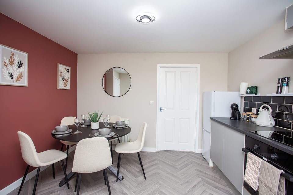 Stylish dining table set for four, perfect for home-cooked dinners.