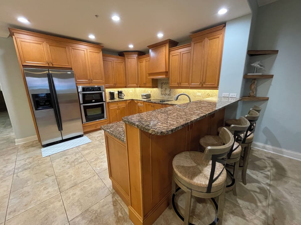 Casual dining made easy with four barstools at the kitchen bar