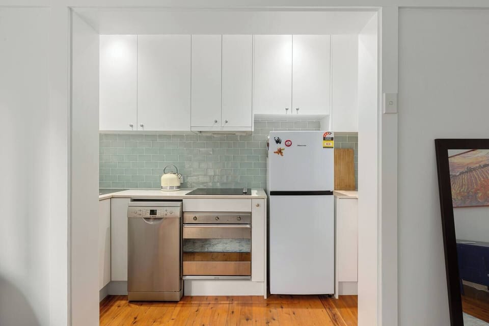 Modern appliances such as a fridge, oven, dishwasher, microwave, kettle and stovetop support effortless meal preparation for guests who prefer to cook in.