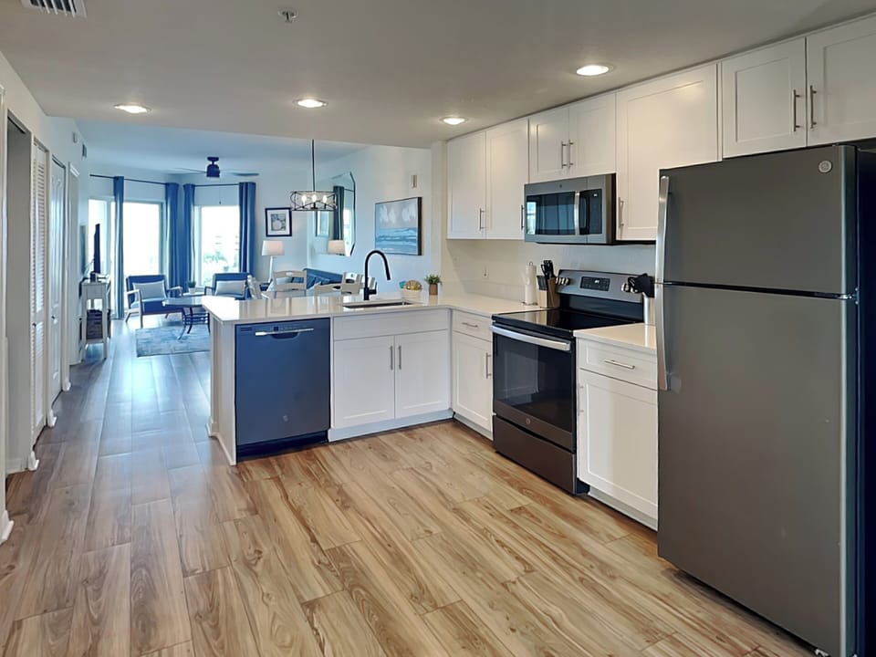 Kitchen – Fully Equipped w. Stainless Appliances + Spacious Layout