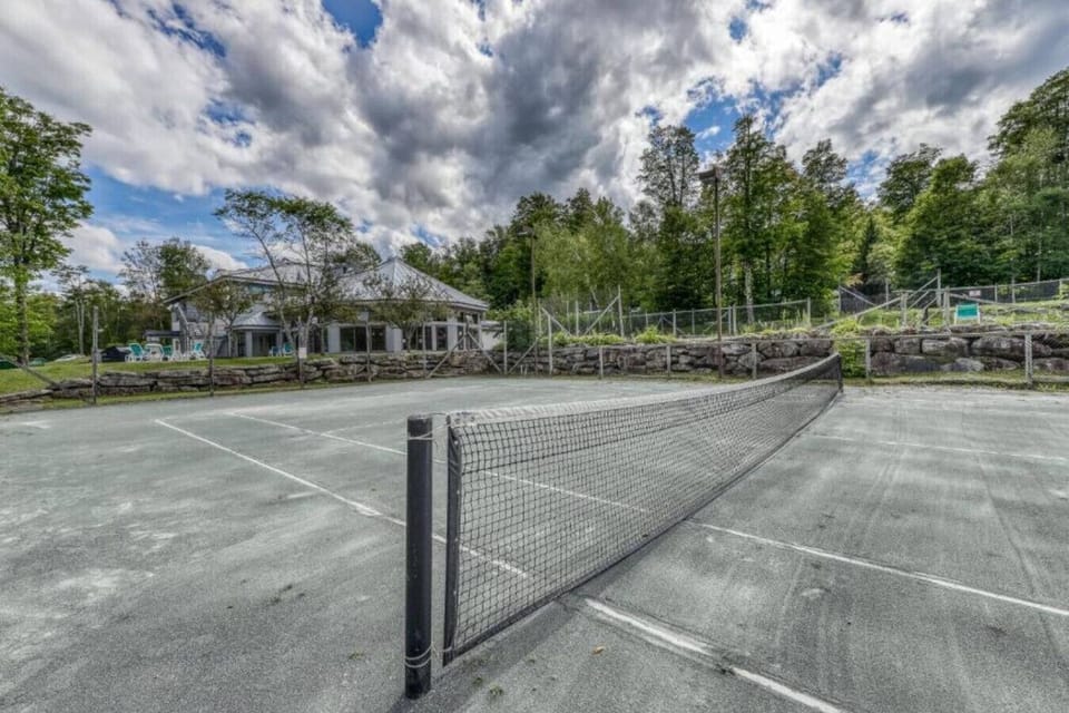 Game on at our sunny outdoor tennis court!