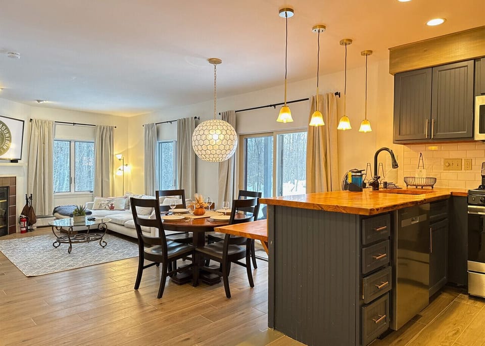 The living room and kitchen are combined for a modern, open feel.