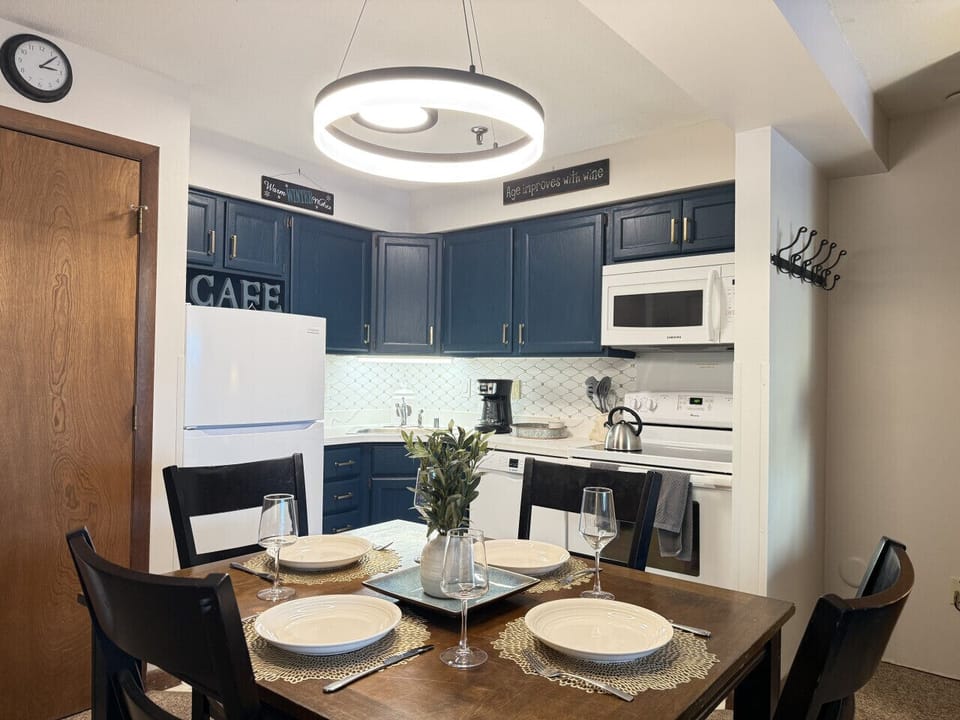 Bright and inviting four-seat dining table.
