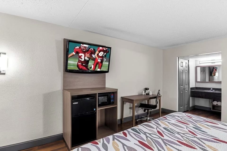 Settle in comfortably with a handy desk and in-room kitchenette.