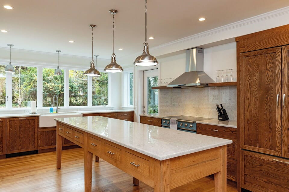This bright, newly updated kitchen offers all-new appliances, fresh cabinets, and a custom island—perfect for gathering, cooking, and enjoying time together.