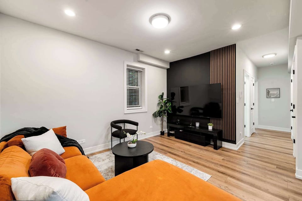 Comfy living nook w/ bold accents for laid-back lounging.