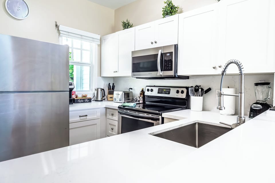 The spacious kitchen is fully equipped, making it easy to create memorable meals