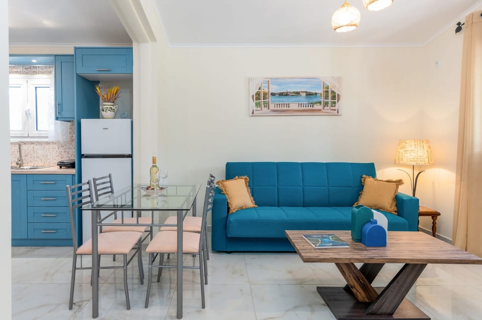 dining and living areas open up to the kitchen
