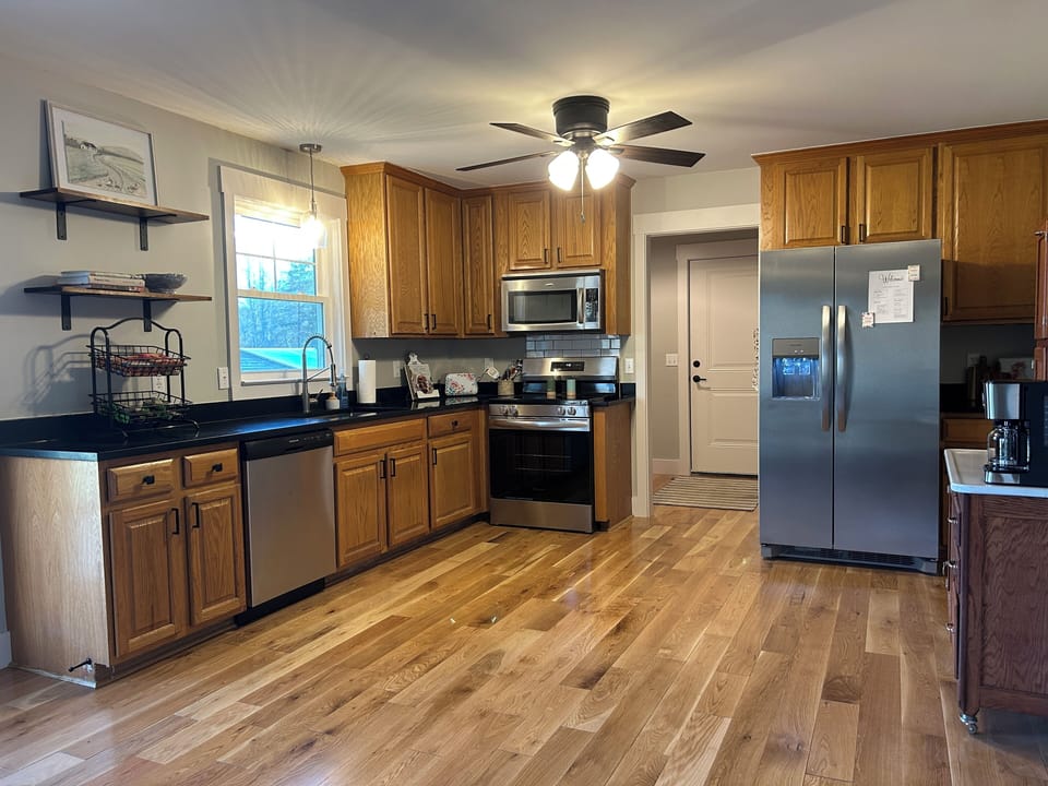 The kitchen is fully stocked with all you'll need from basic spices to utensils.