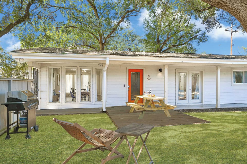 Spacious backyard with covered patio