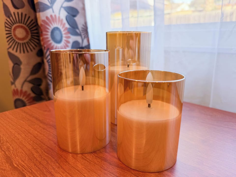 Soft candlelight and warm wood tones add a cozy, intimate touch, perfect for setting a relaxing mood after a day of exploring