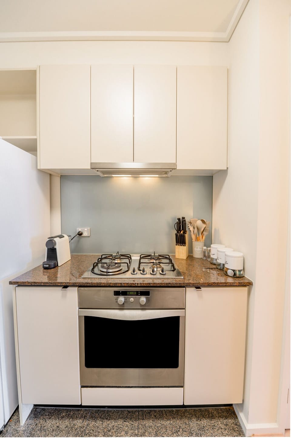 Kitchen - Nespresso coffee machine, Gas cooktop and oven.