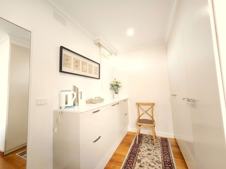 King size bed, walk in wardrobe, hair dryer, kettle, desk