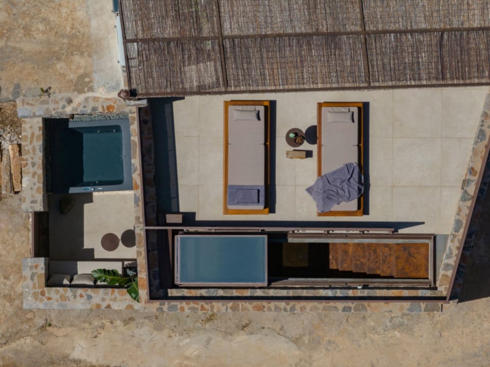 A peaceful Jacuzzi corner inviting slow moments beneath the Cretan sky.