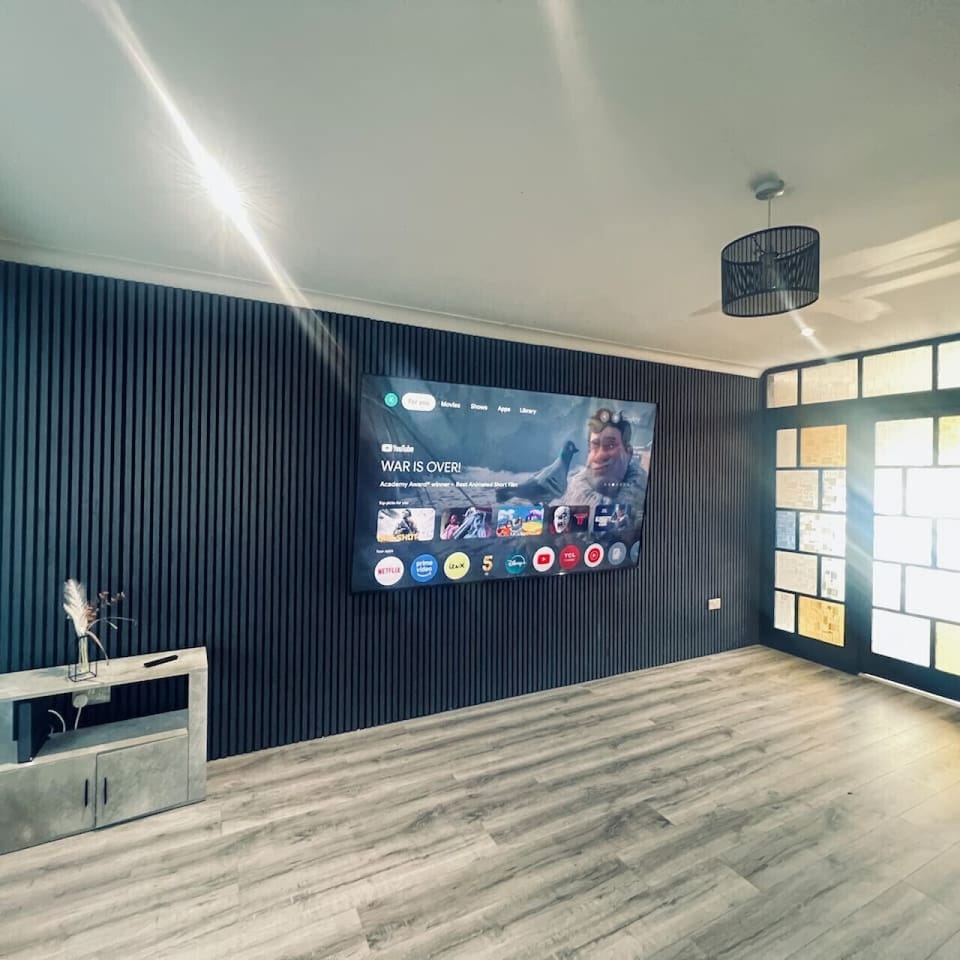 Feature wall with smart TV and sleek finishes