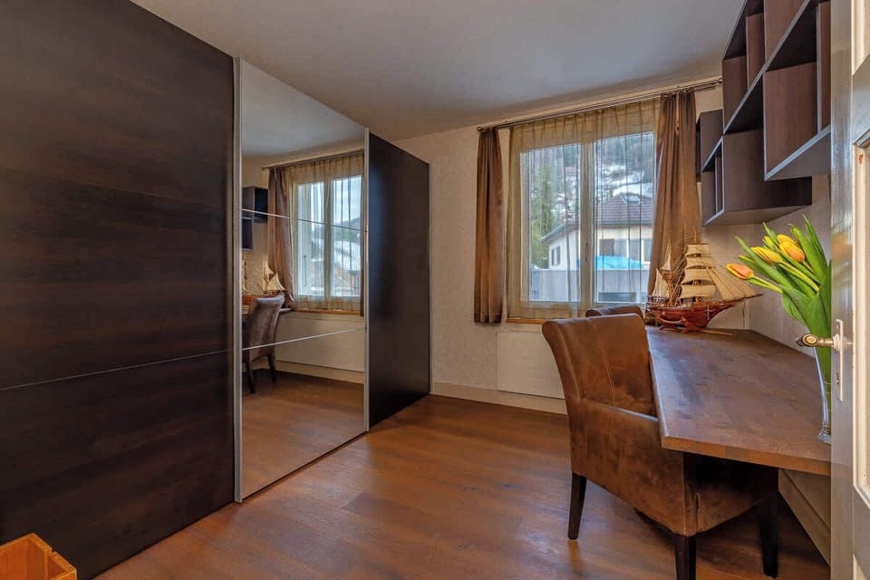 Quiet room with workspace and natural light
