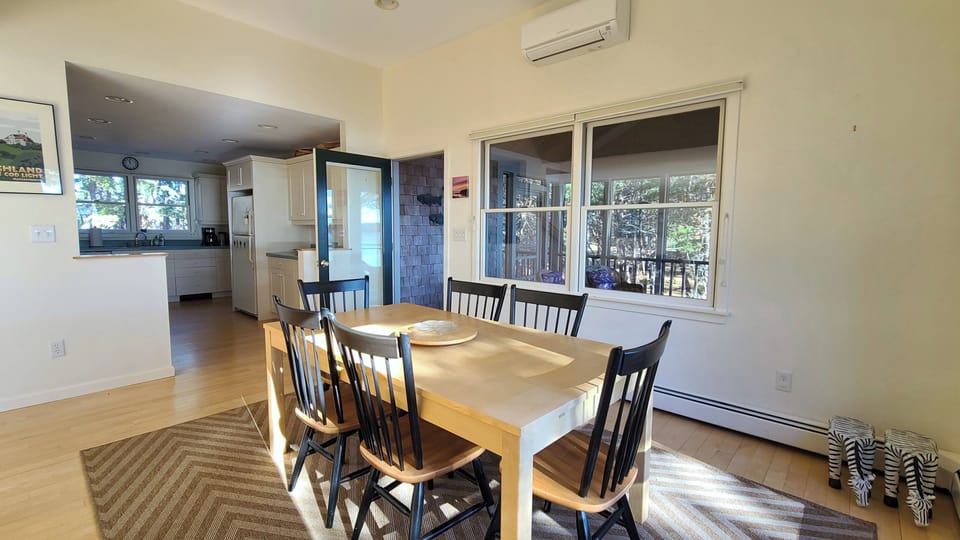 Dining area with door to screen porch