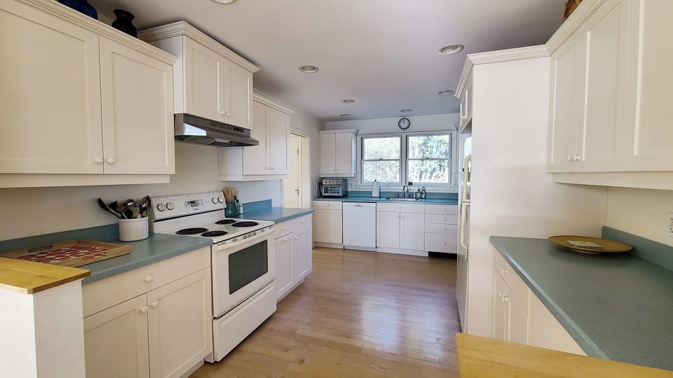 Nicely equipped kitchen off dining area