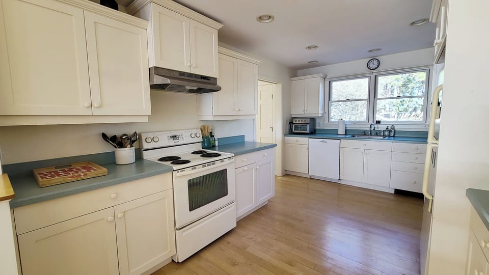 Nicely equipped kitchen off dining area