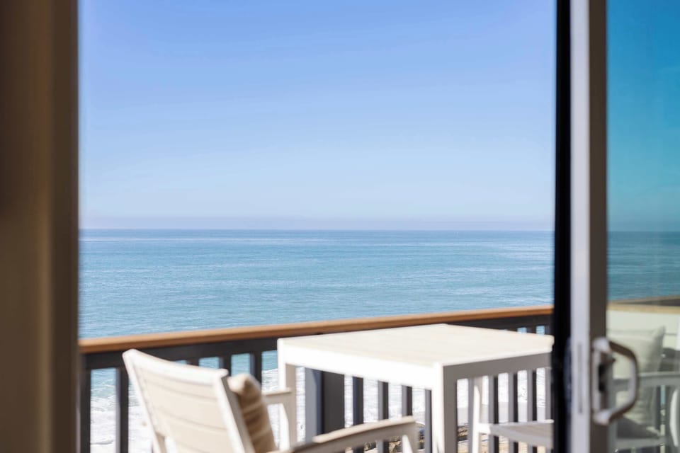 Step outside onto the balcony to enjoy fresh ocean air and stunning views, planning your day or simply unwinding as the sun sets.